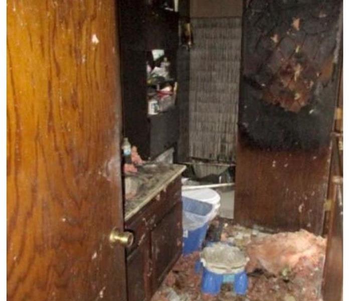 Bathroom damaged by fire 